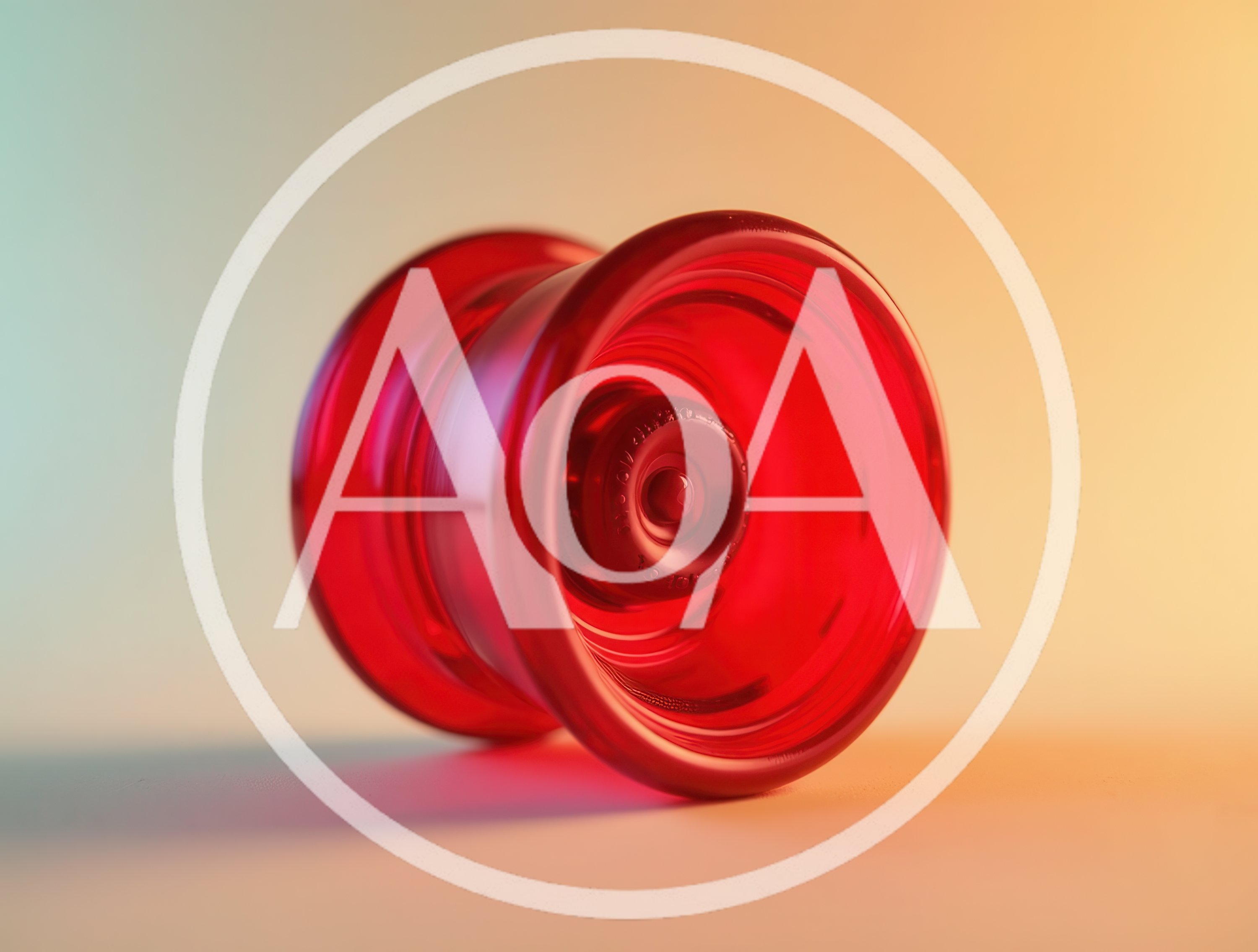 Red Translucent Yo-Yo Resting On A Gradient Background