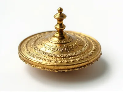 Ornate Gold Spinning Top Isolated On White