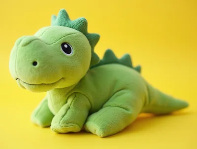 Green Dinosaur Plush Toy On Yellow Background