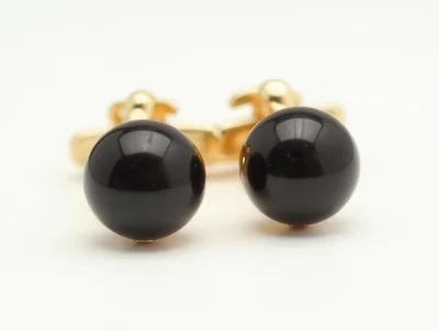 Pair Of Gold Cufflinks With Black Spherical Stones