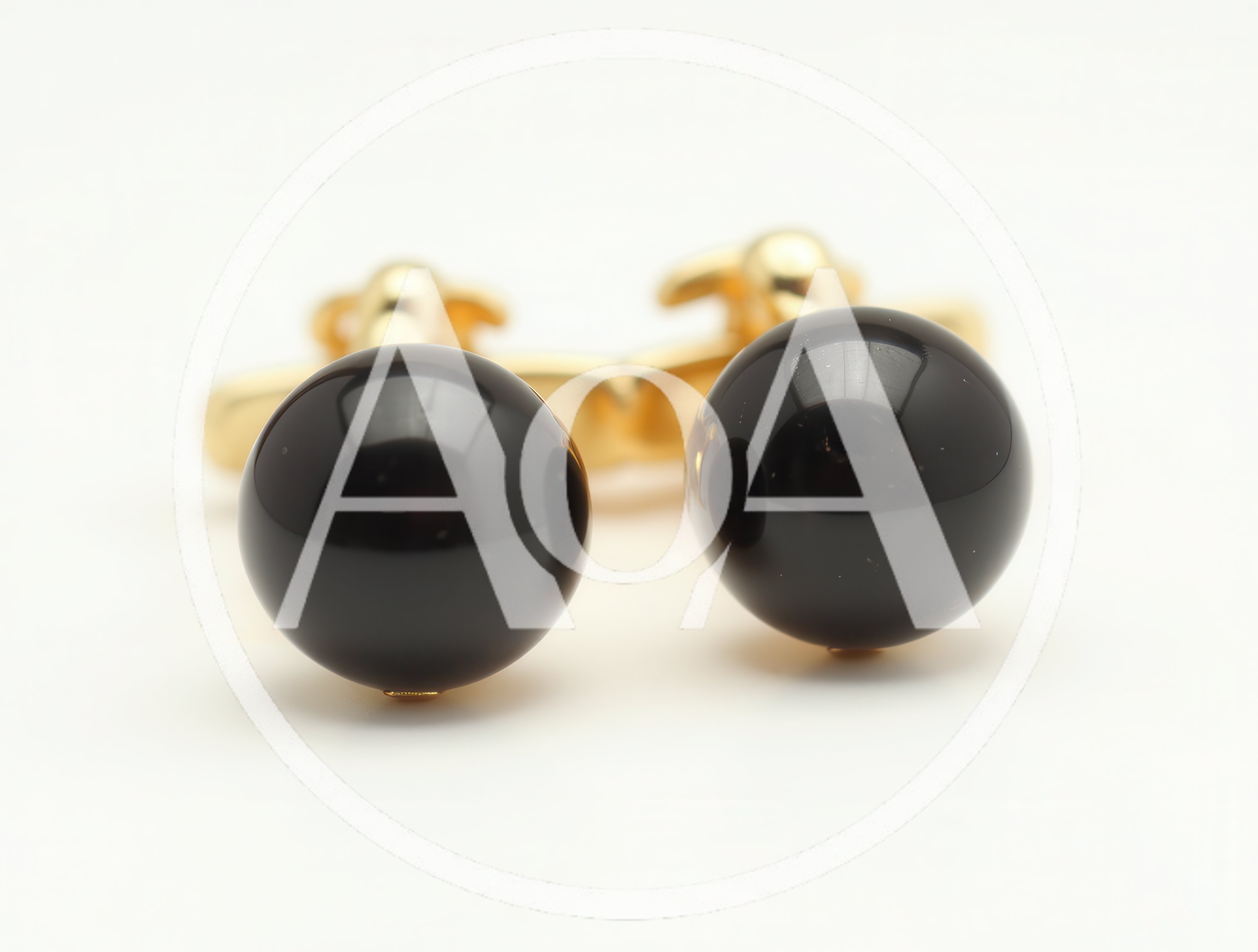 Pair Of Gold Cufflinks With Black Spherical Stones
