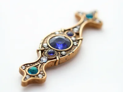 Ornate Vintage Style Brooch With Blue Gemstones