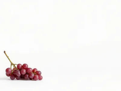 Fresh Red Grapes Cluster on White Background