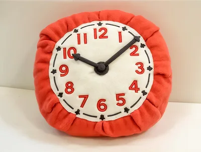 Plush Clock Pillow With Red Fabric Border