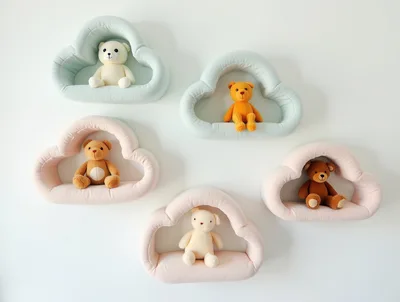 Five Plush Teddy Bears Sitting On Cloud Shaped Shelves