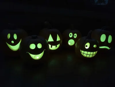 Group Of Glowing Halloween Jack O Lanterns