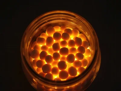 Glowing Spheres Inside A Glass Jar