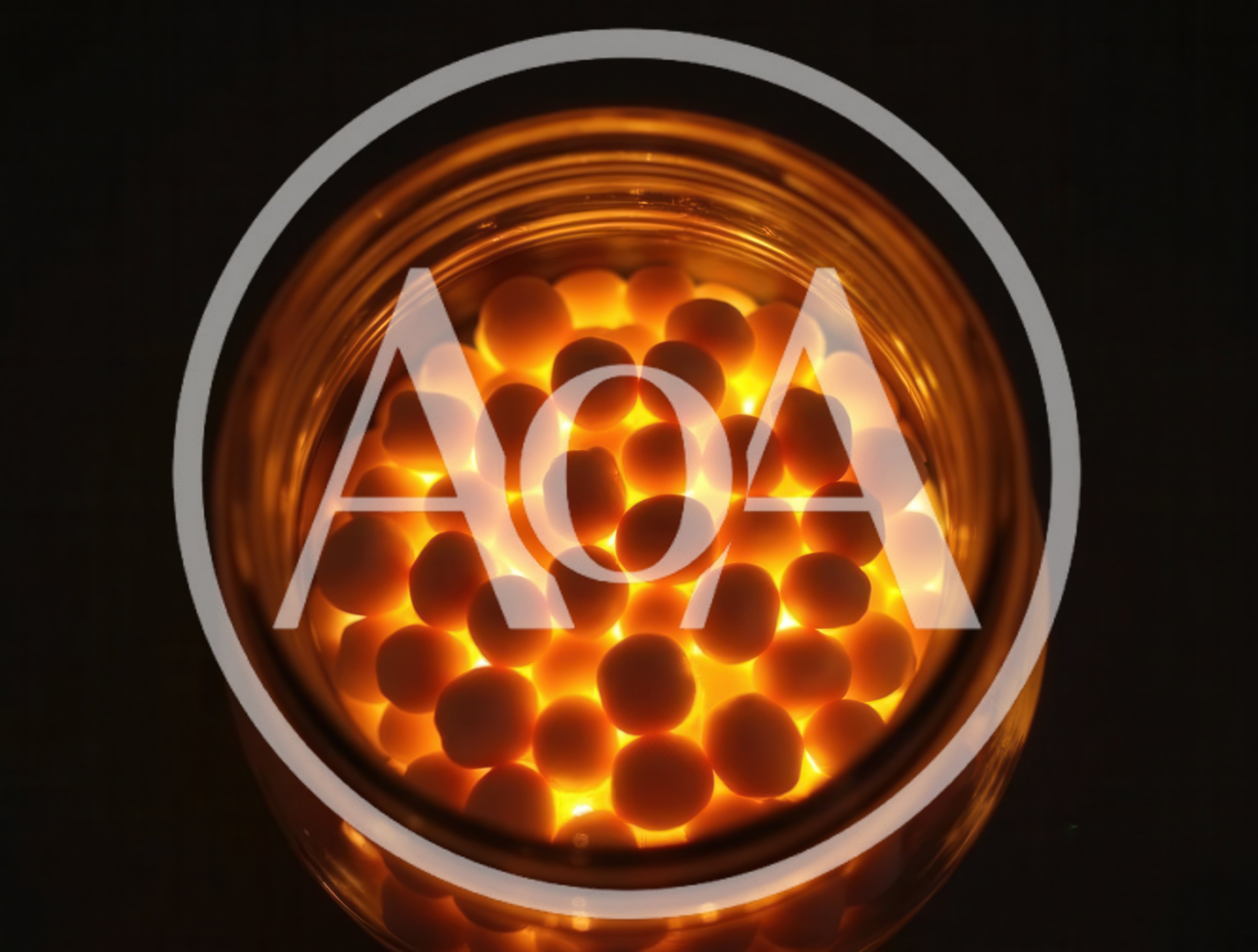 Glowing Spheres Inside A Glass Jar