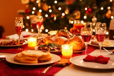 Festive Christmas Dinner Table Setting With Roasted Turkey