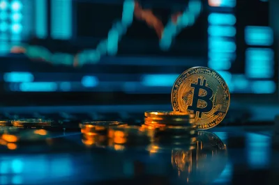Bitcoin Cryptocurrency Coin Resting On A Laptop Keyboard