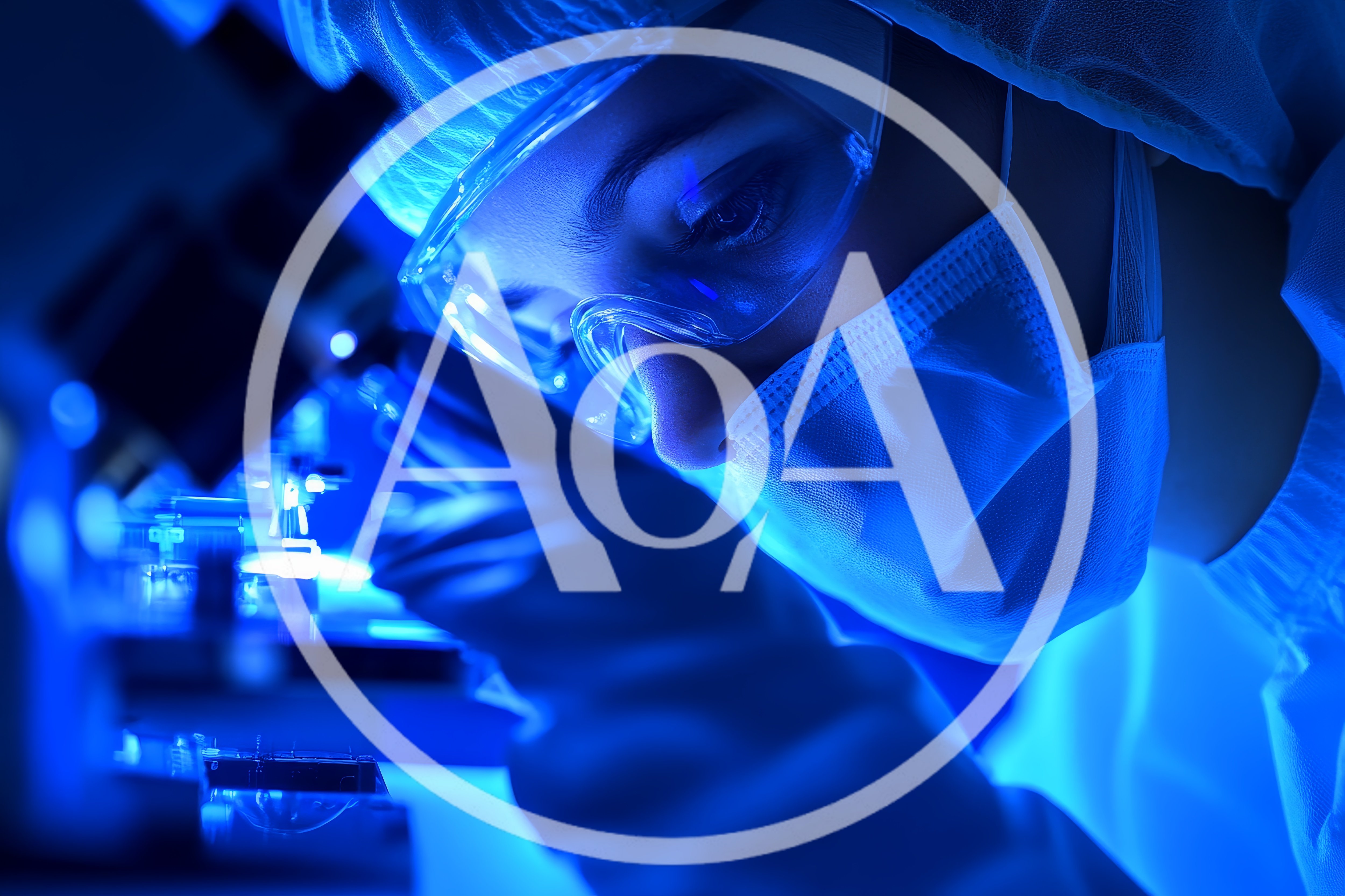 Scientist Examining Samples Under Microscope In Laboratory