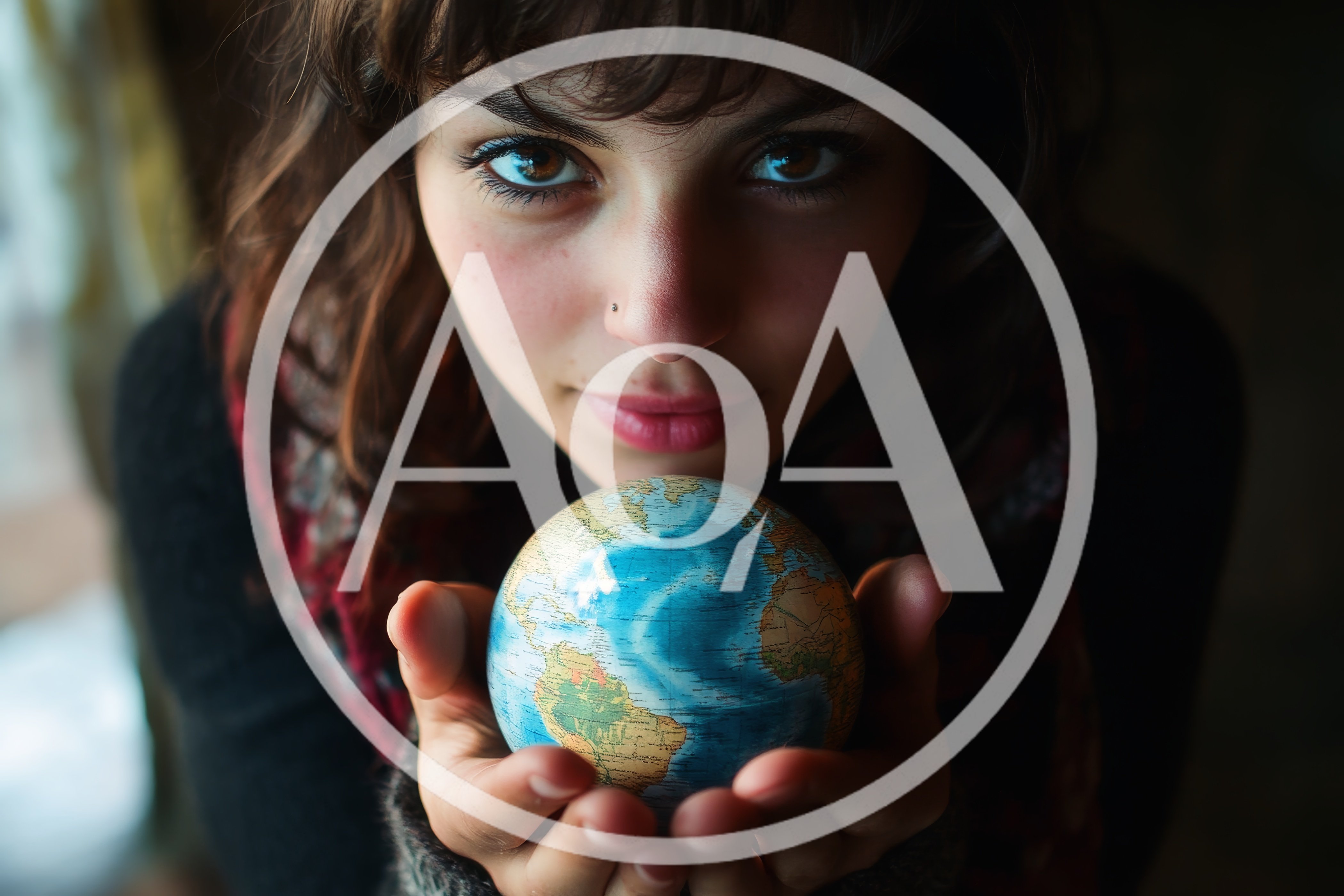 Young Woman Holding A Small Globe In Her Hands