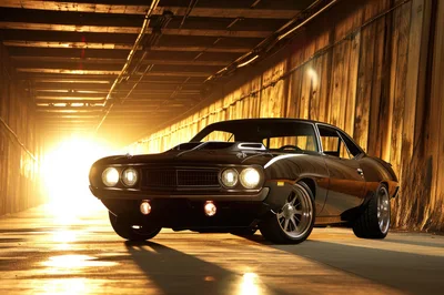 Black Muscle Car Parked Inside A Tunnel