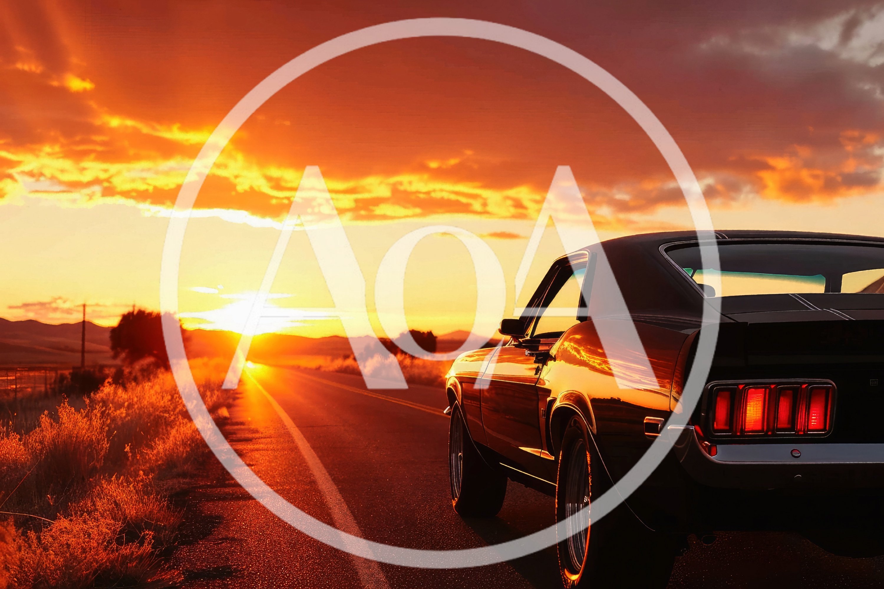 Classic Muscle Car Driving Down A Desert Highway At Sunset