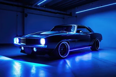 Customized Classic Muscle Car in Neon Blue Lighting