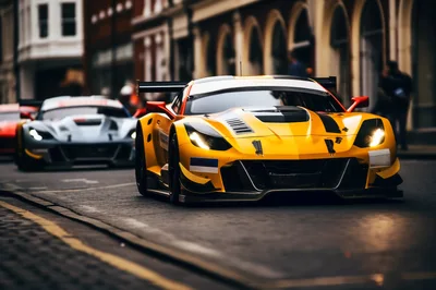 Yellow And Silver Racing Cars Driving On City Street