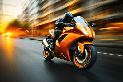 Orange Sportbike Riding Fast Through City Streets