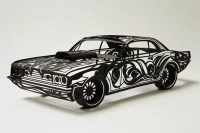 Intricate Paper Cutout Model Of A Muscle Car