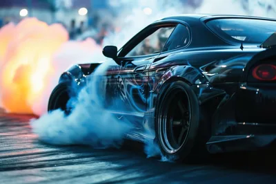 Black Toyota Supra Drifting With Tire Smoke