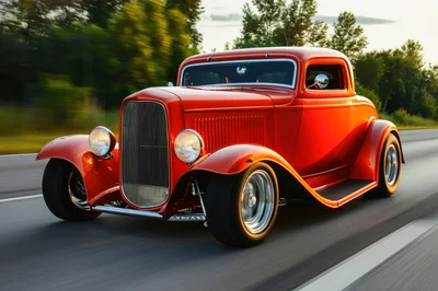 Classic Red Hot Rod Driving On Highway