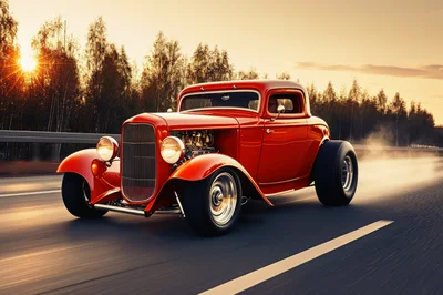 Red Hot Rod Driving On Highway At Sunset