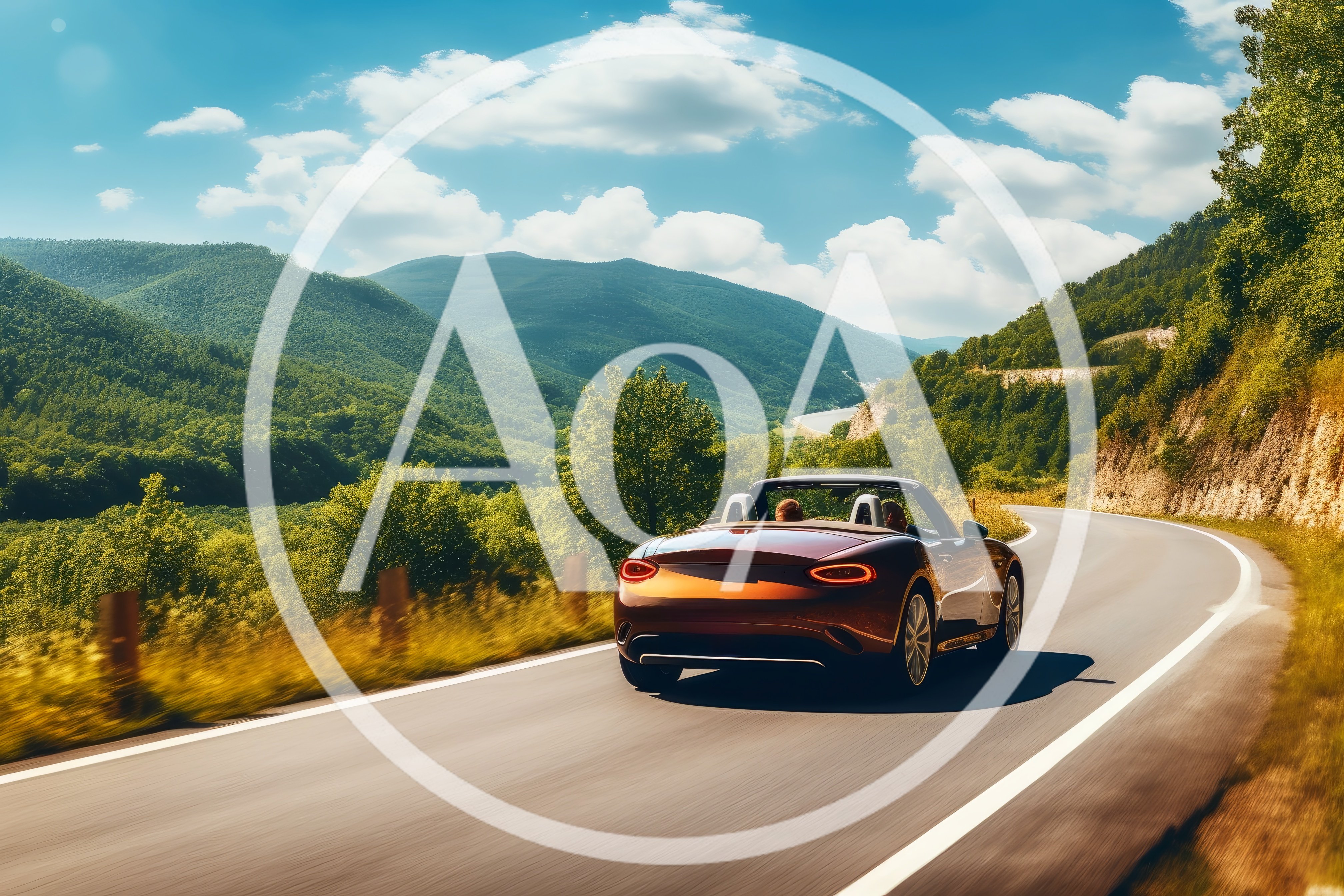 Convertible Sports Car Driving Along Scenic Mountain Road