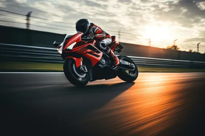 Professional Motorcyclist Racing Red Superbike On Track