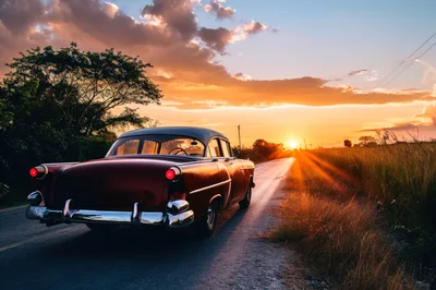 Vintage Classic Car Parked On Rural Road At Sunset