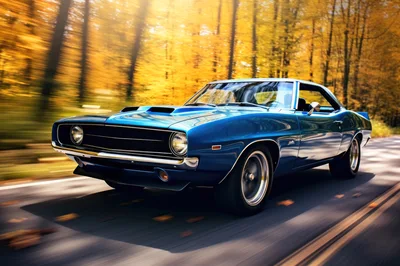 Blue Classic Muscle Car Driving Through Autumn Forest