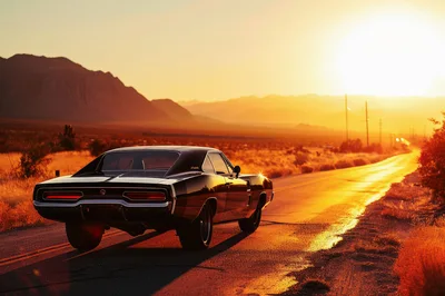 Classic Black Muscle Car Driving On Desert Road