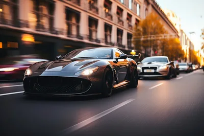 Black Sports Car Driving Fast Through City Street