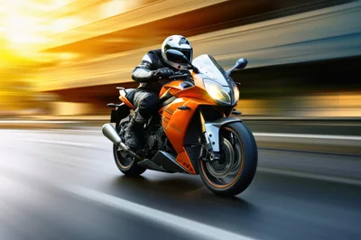 Orange Sportbike Riding Fast On City Highway