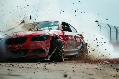 Damaged Red Sports Car Crashing On Racetrack
