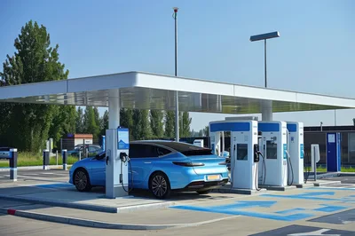 Electric Vehicle Charging at Modern Outdoor Station