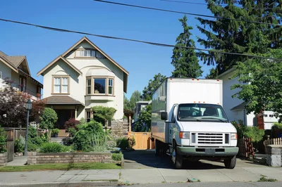 Moving Truck Parked In Residential Driveway