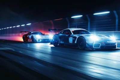 Two Racing Cars Speeding On A Night Track