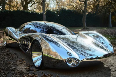Futuristic Chrome Concept Car Parked In Autumn Forest