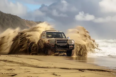 Off-Road SUV Driving Through Sand On Beach