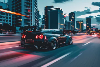 Modified Nissan GT-R Driving Through City at Night