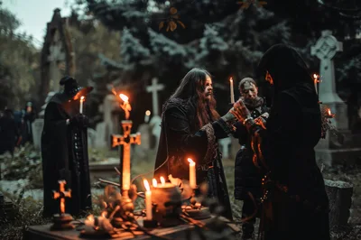 Occult Ritual Ceremony With Candles In A Graveyard
