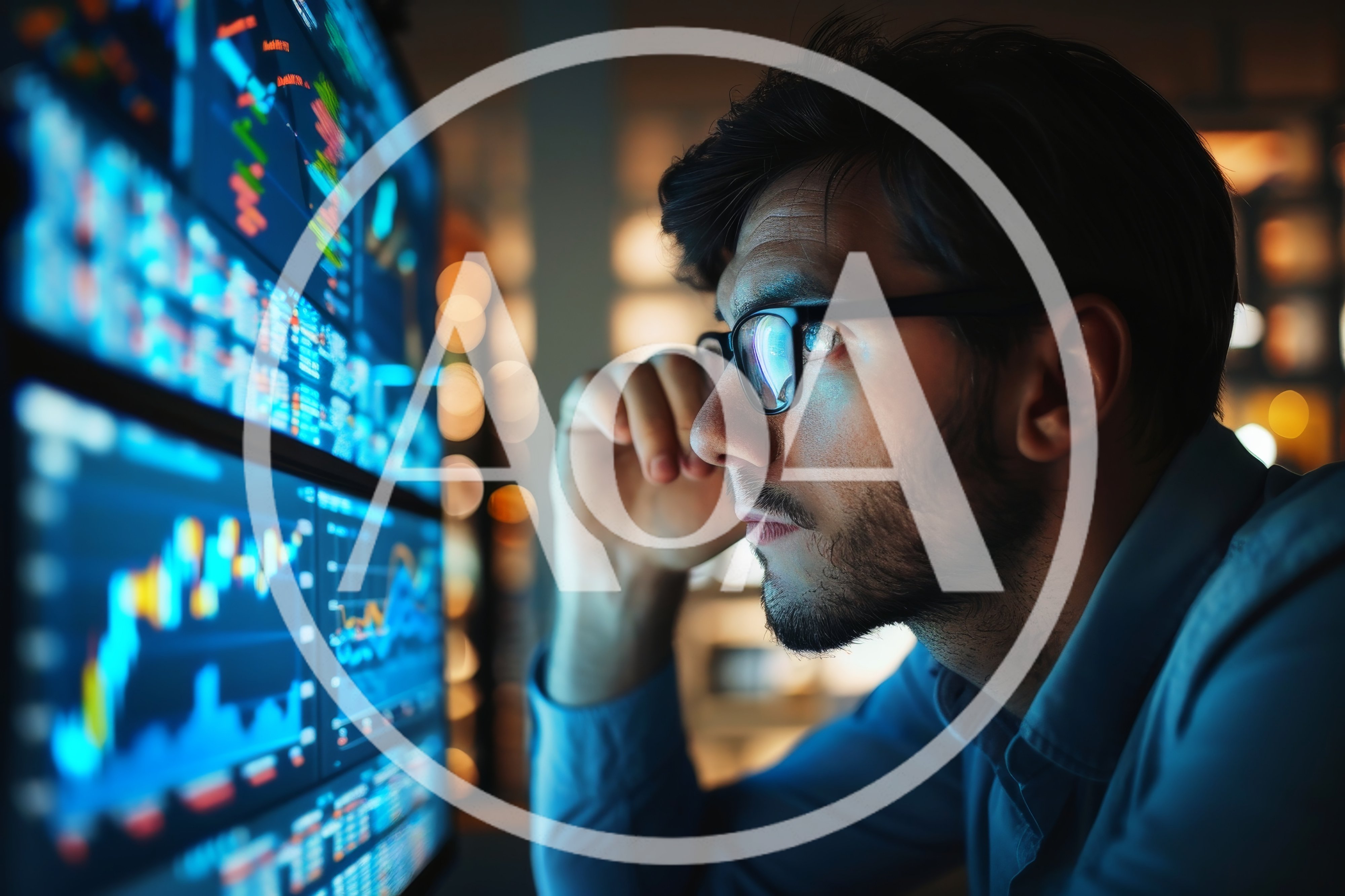 Financial Trader Analyzing Stock Market Data On Multiple Monitors