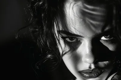 Dramatic Close Up Portrait Of A Woman With Intense Gaze