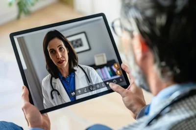 Doctor Participating In A Virtual Telemedicine Consultation