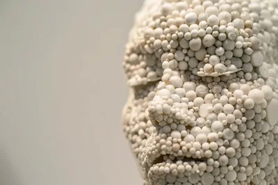 Close Up Of A Sculpture Made Of White Beads