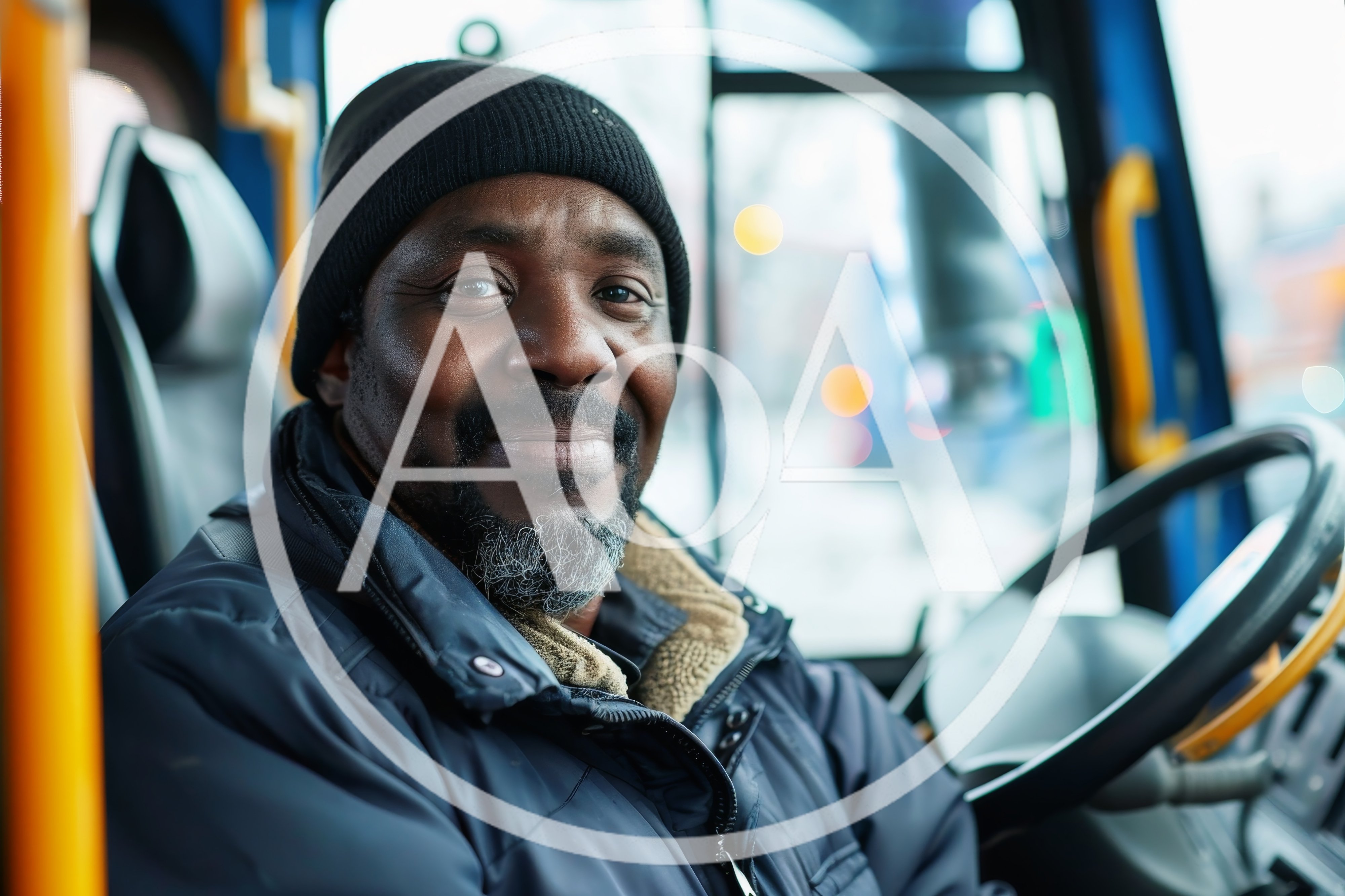 Portrait Of A Smiling Bus Driver In Uniform