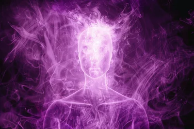 Ethereal Human Silhouette Surrounded By Swirling Purple Smoke
