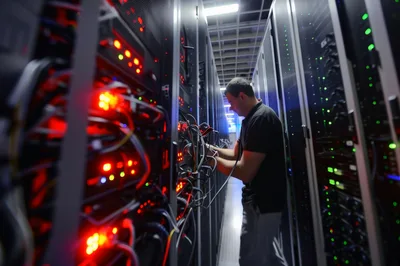 IT Technician Working In A Modern Data Center