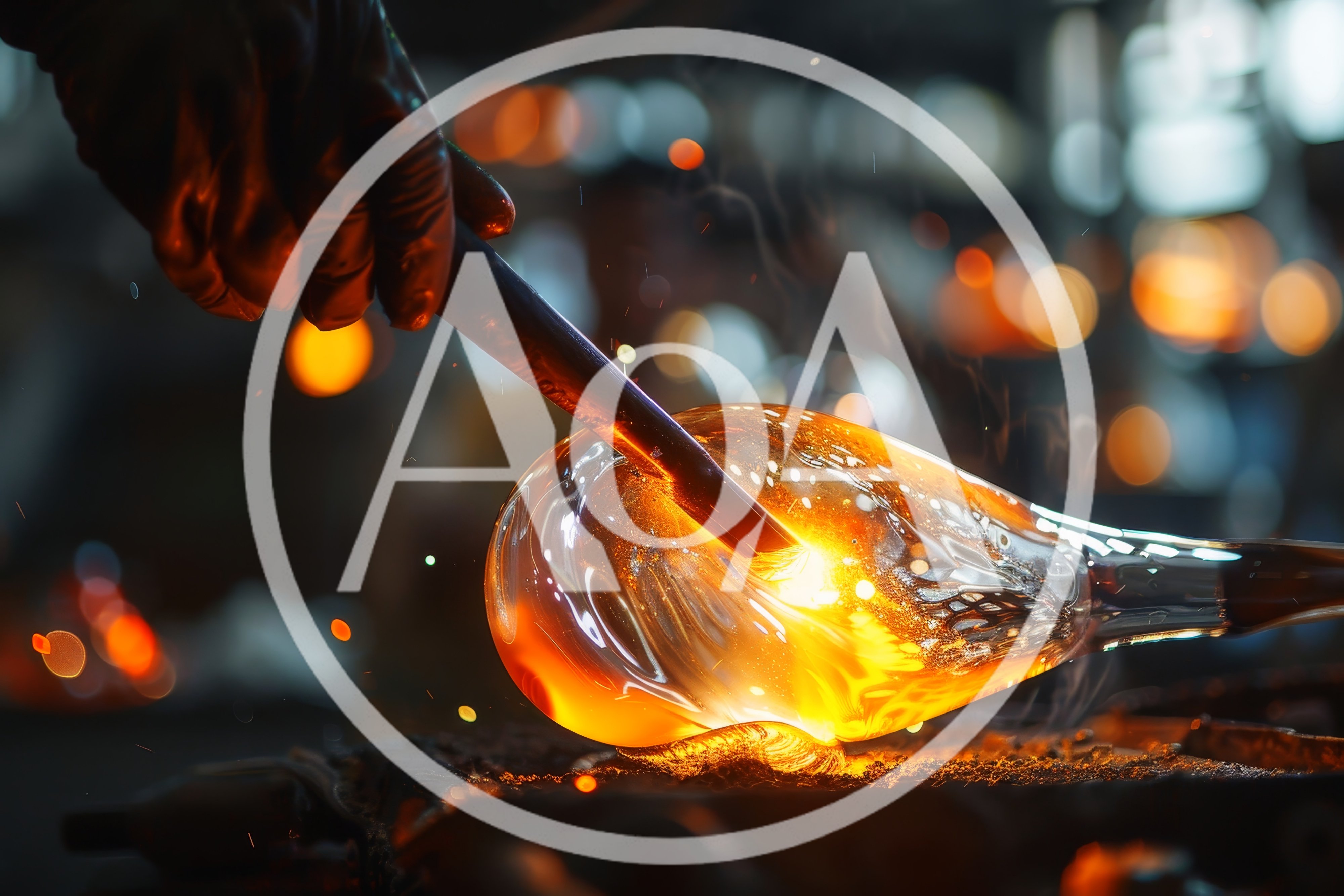 Glassblower Shaping Molten Glass With Metal Tool