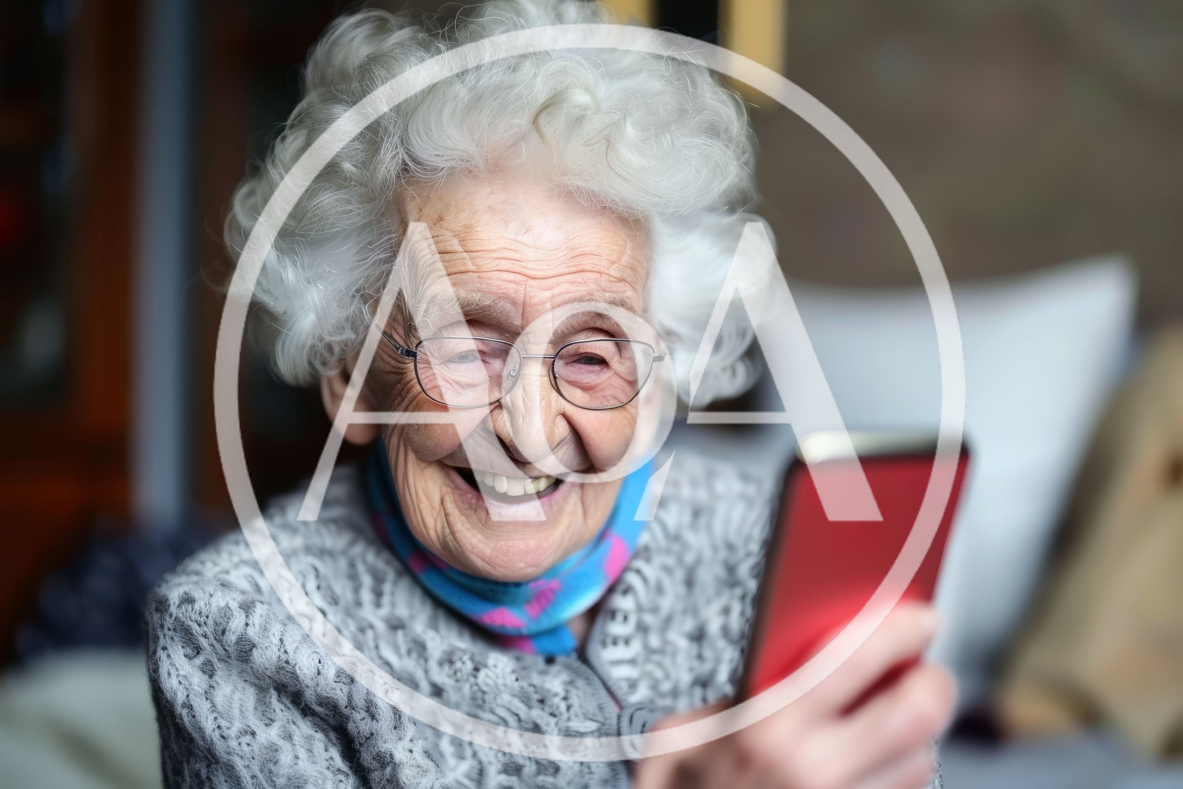 Elderly Woman Laughing While Using A Smartphone