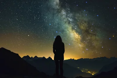 Silhouette Of A Woman Watching The Milky Way Galaxy